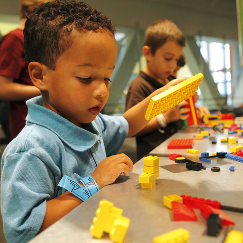 Toddler with Legos