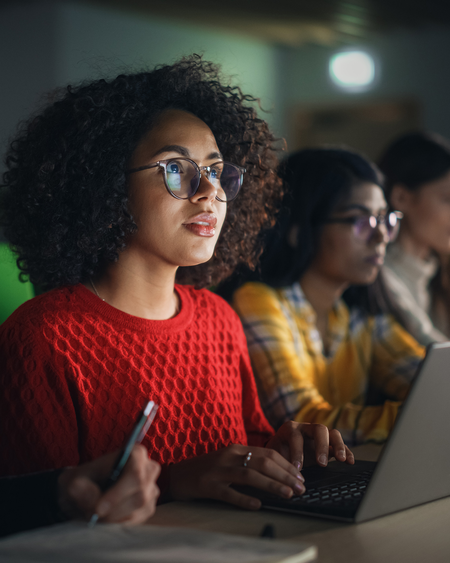 Young women in front of computer
